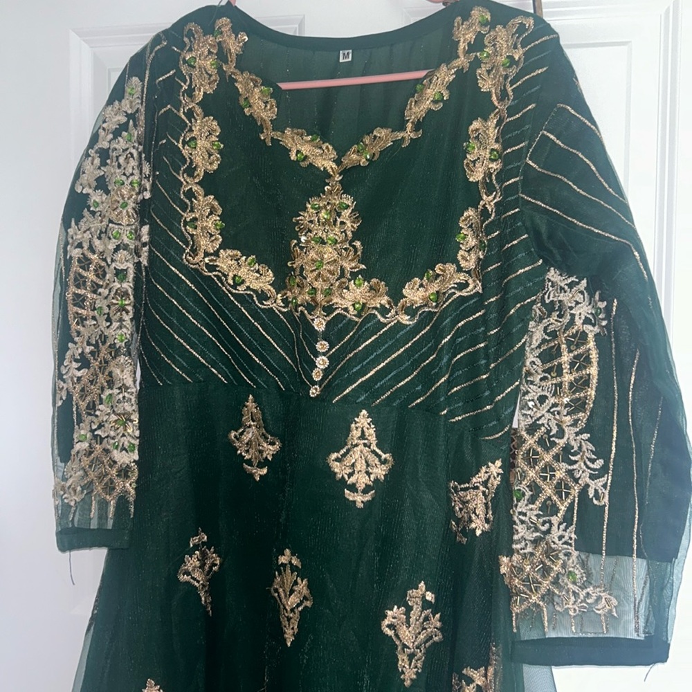Intricate dark green dress